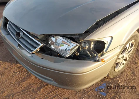 2001 Toyota Camry Le z USA, uszkodzony, nr VIN JT2BG28K810539370